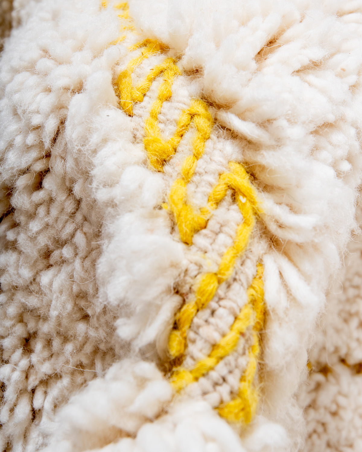 Modern, designer, handcrafted Berber rug from Morocco. Beniourain carpet with beautiful colours and patterns and fluffy wool texture.